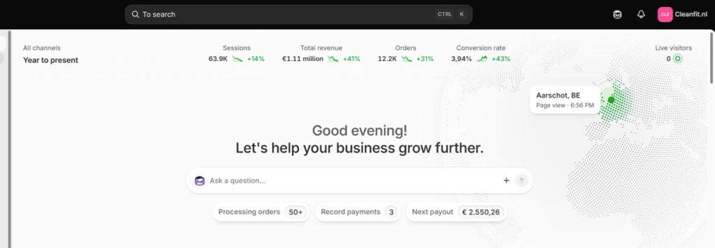 Dashboard hero showing a greeting message, a large search bar, KPI metrics (Sessions, Revenue, Orders, Conversion rate) and a dotted world map background.